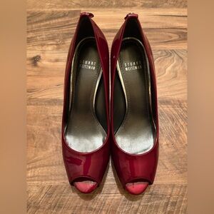 Red Hot Quasar Stuart Weitzman patent leather pumps.